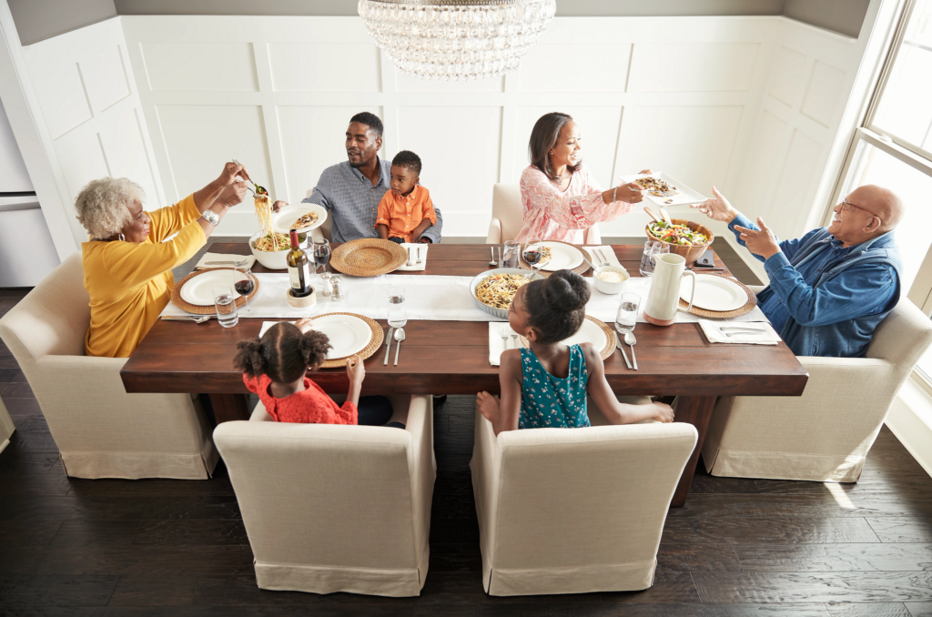 Family having breakfast at the dining table | Brooks Flooring Services Inc
