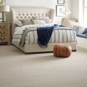 Cream colored Shaw Floors carpet in a contemporary bedroom | Brooks Flooring Services Inc